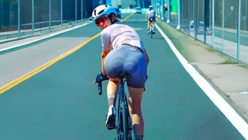 Cyclist glancing back during a ride